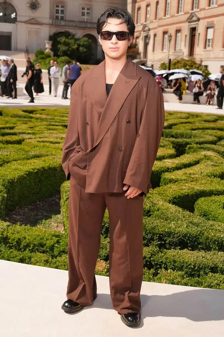 Actor Hudson Williams Battles Heat at Balenciaga Show