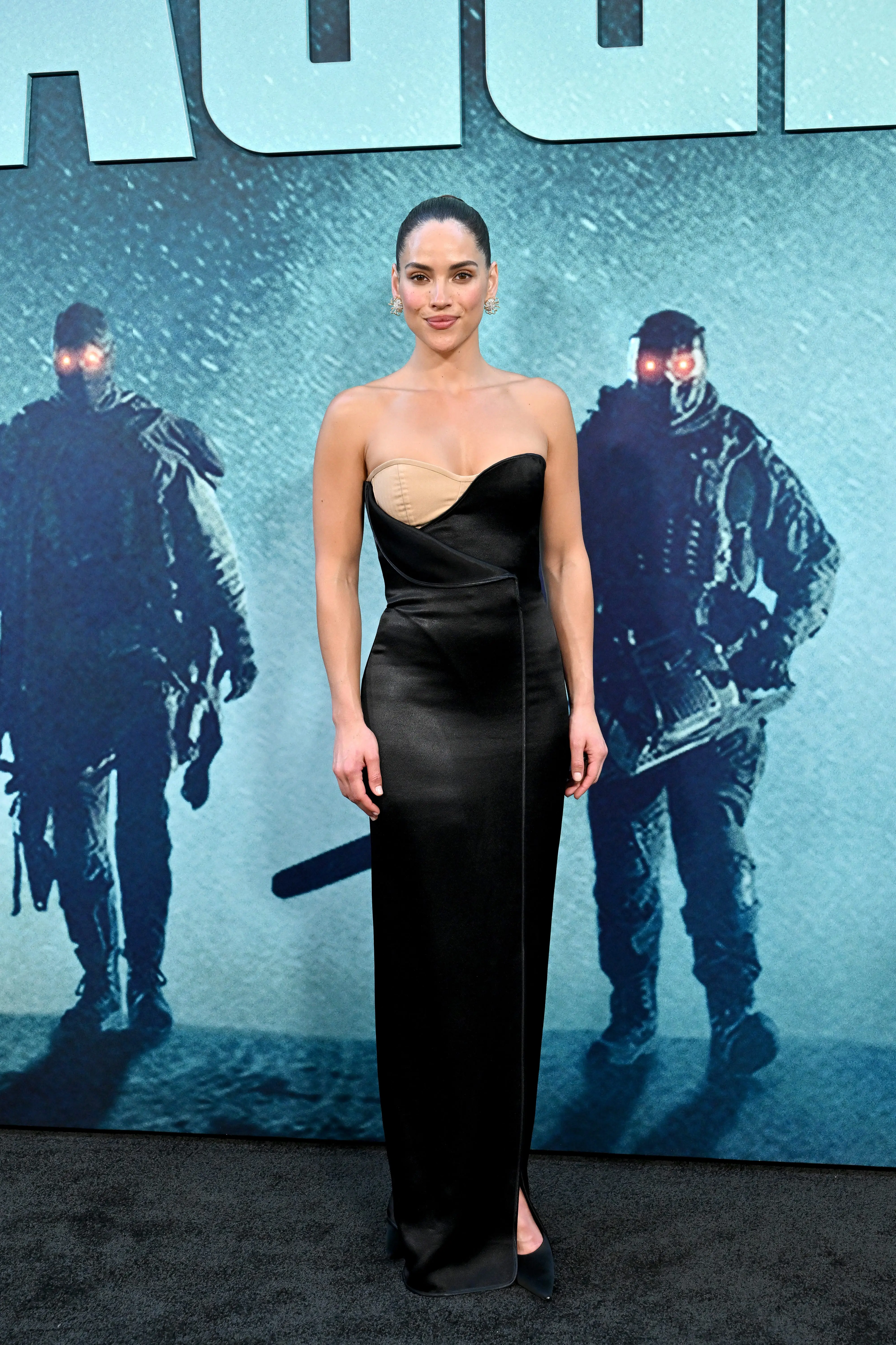Adria Arjona Stuns in Custom Calvin Klein Dress at Onslaught Premiere