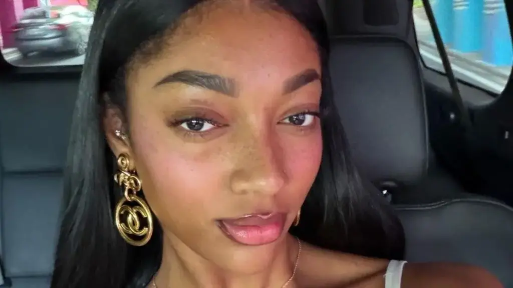 Angel Reese Sizzles in Tiny Gold Bikini
