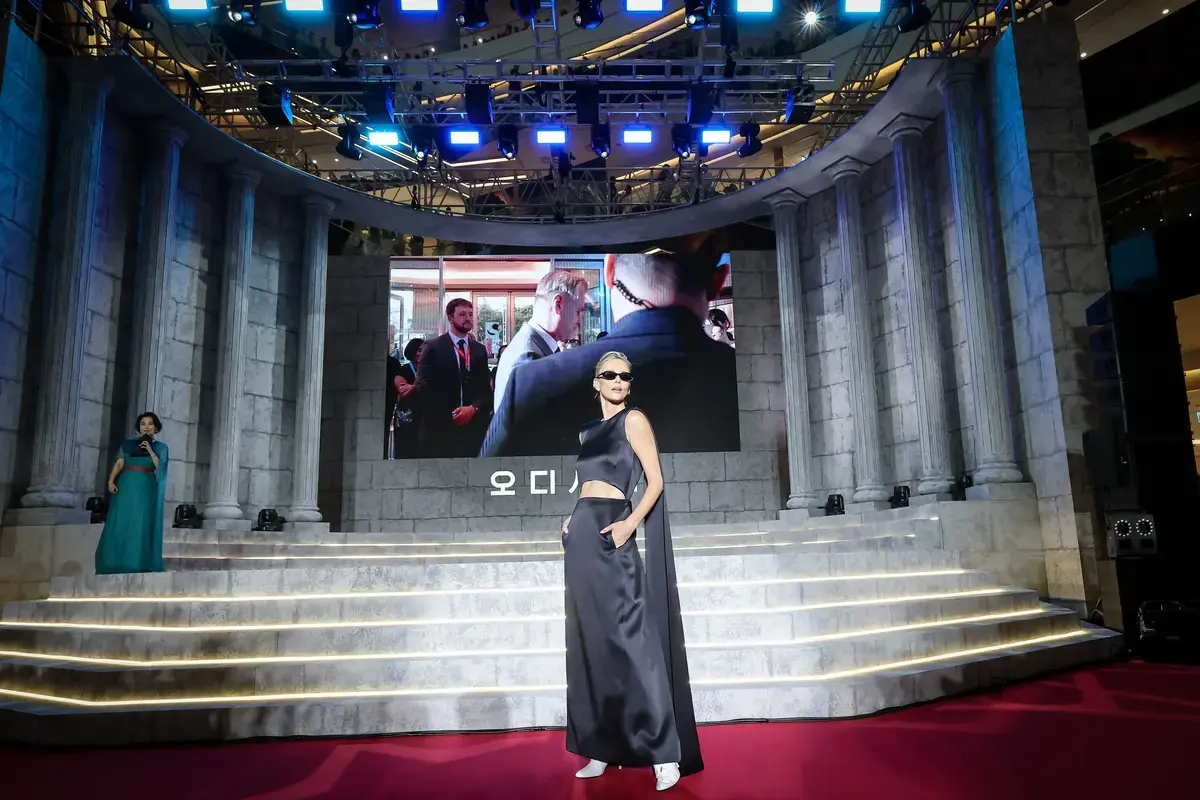 Charlize Theron Continues Style Showcase
