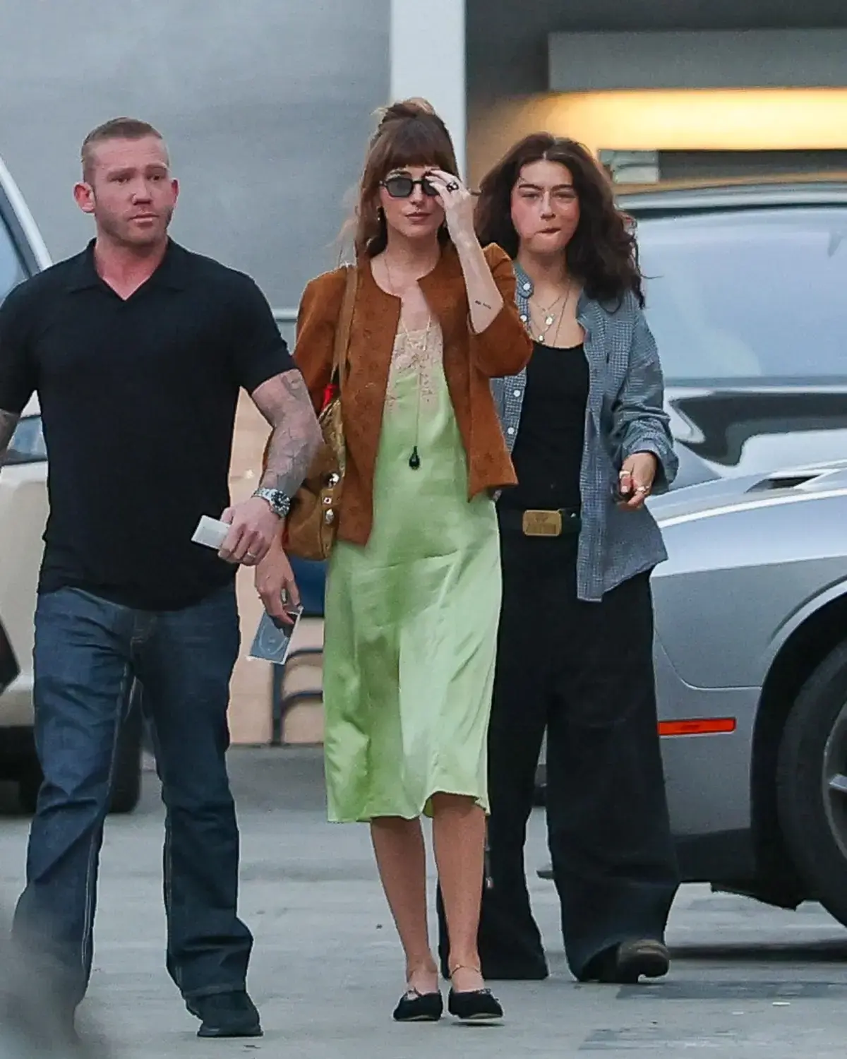 Dakota Johnson Sports Unique Color Combination at Hollywood Bowl