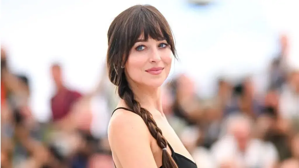 Dakota Johnson Stars in Valentino Beauty Campaign with Bold Red Gown
