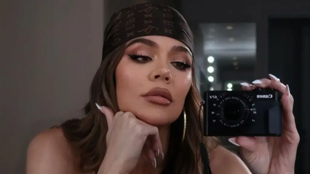 Khloe Kardashian Stuns in Wet See-Through Dress for Sultry XO Blue Shoot