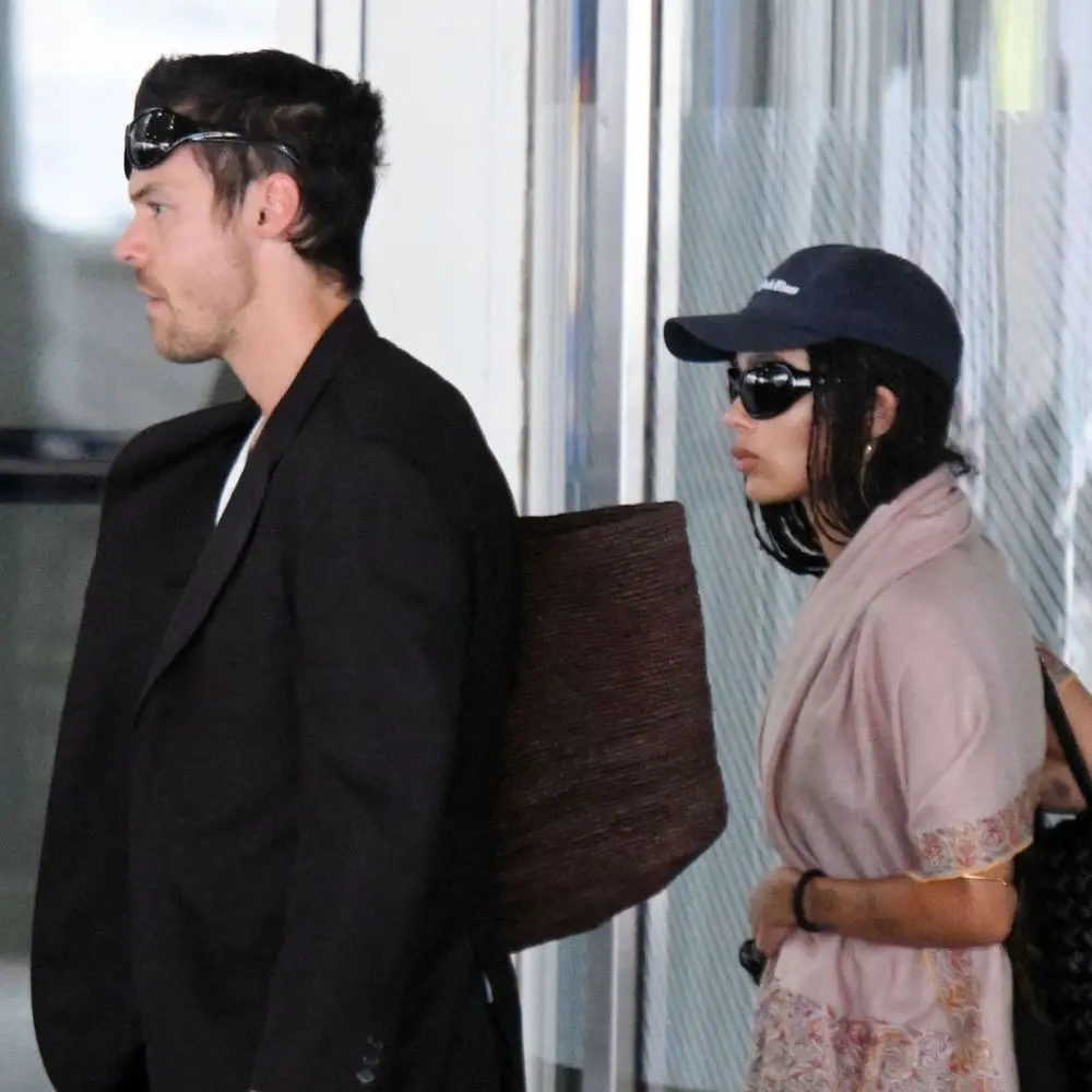 If You Want Your Airport Outfits to Give First Class—Ditch Your Jacket For This Elegant Staple Instead