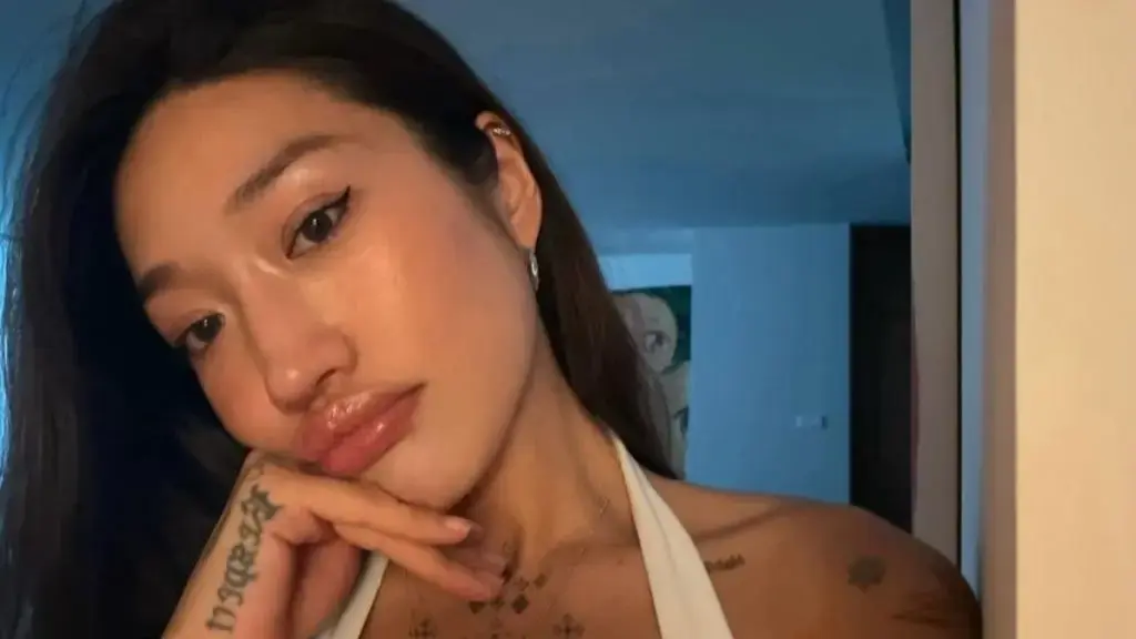Peggy Gou's Cleavage Tattoos Steal the Show