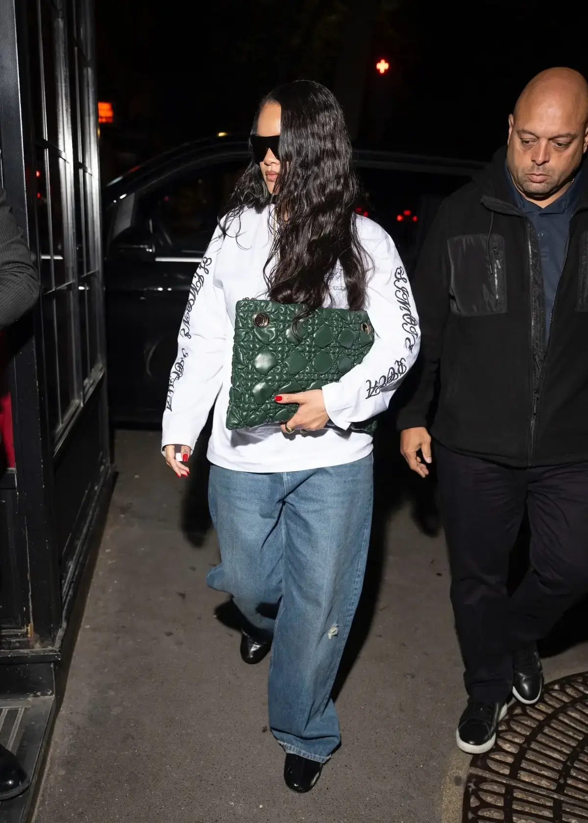 Rihanna’s Green Dior Bag Completes Nighttime Outfit