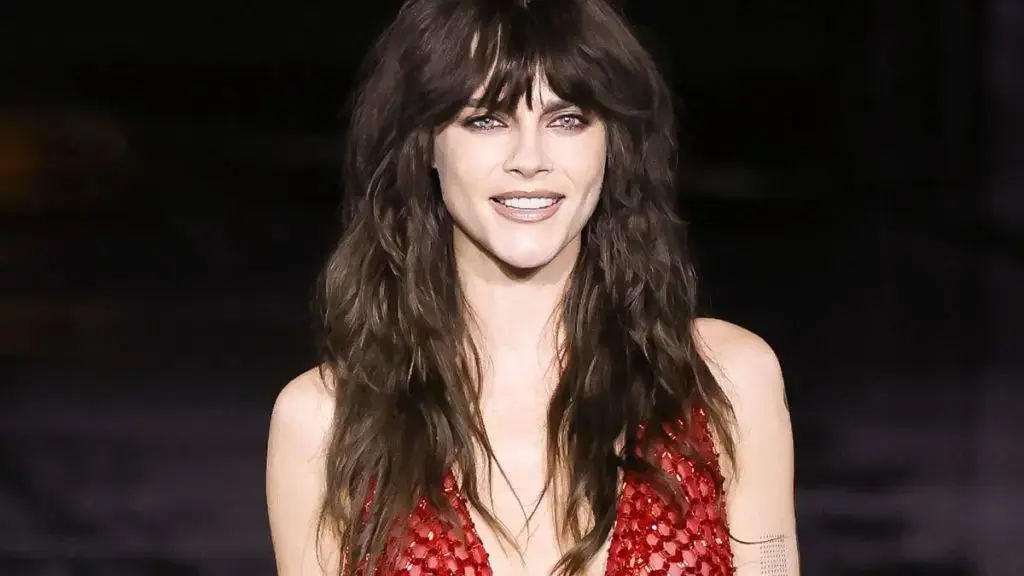 Cara Delevingne Stuns in Red Sheer Gown at Paris Fashion Week
