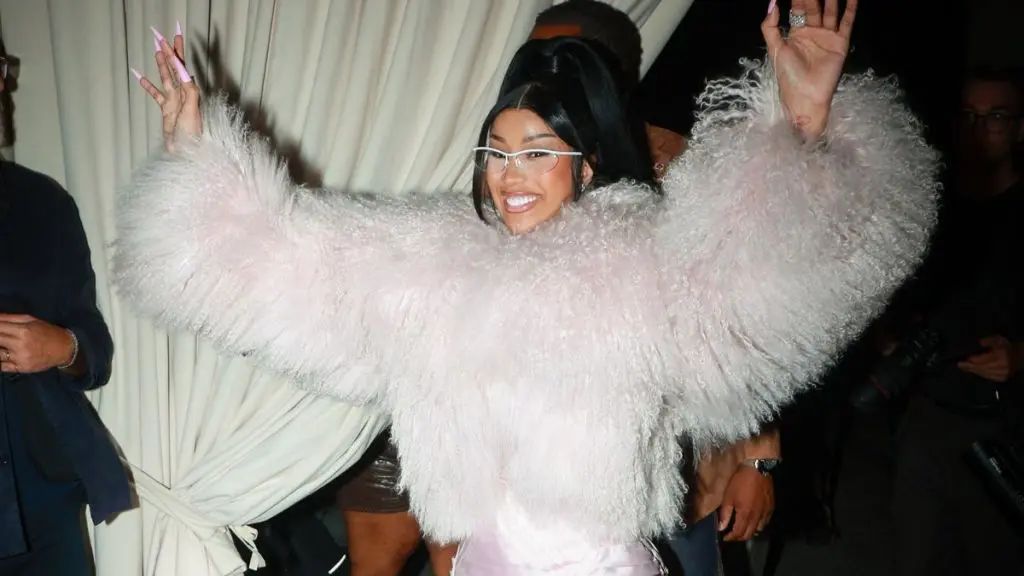 Cardi B Stuns Milan Fashion Week in Bold All-Pink Ribbon Attire