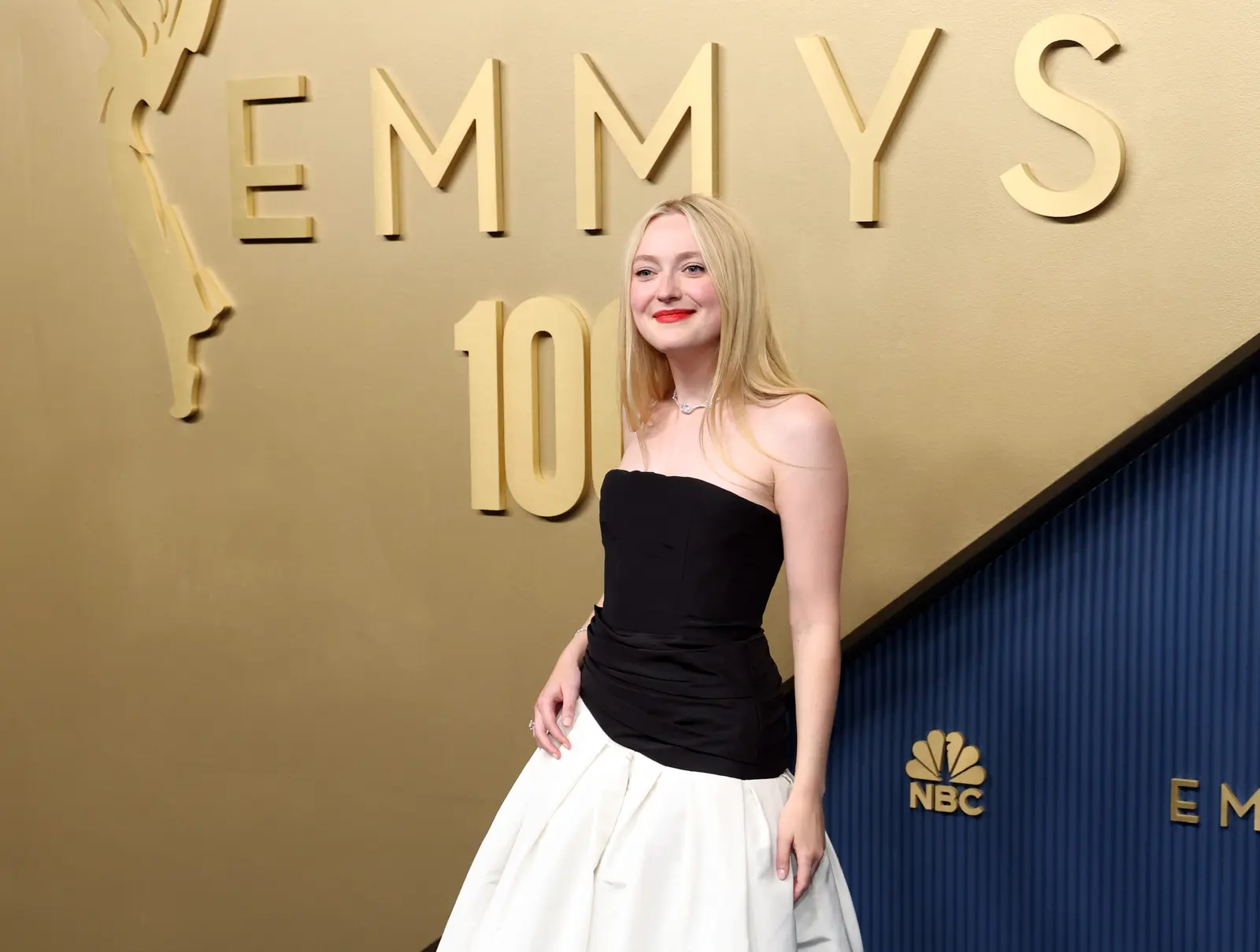 Dakota Fanning Stuns at Emmys in Gown by New York Designer