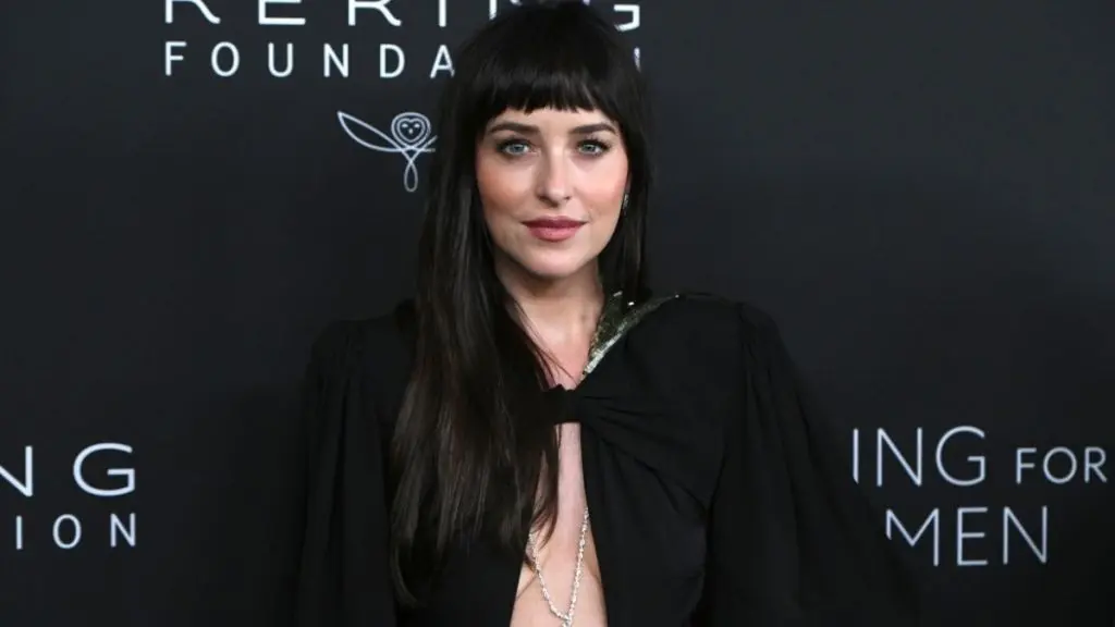 Dakota Johnson Wears Risky Cutout Gown at Kering Gala