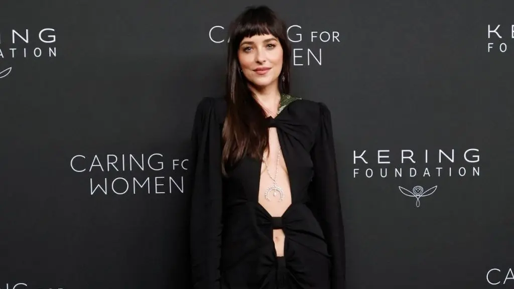 Dakota Johnson Stuns in Backless Black Gown at NYFW Dinner