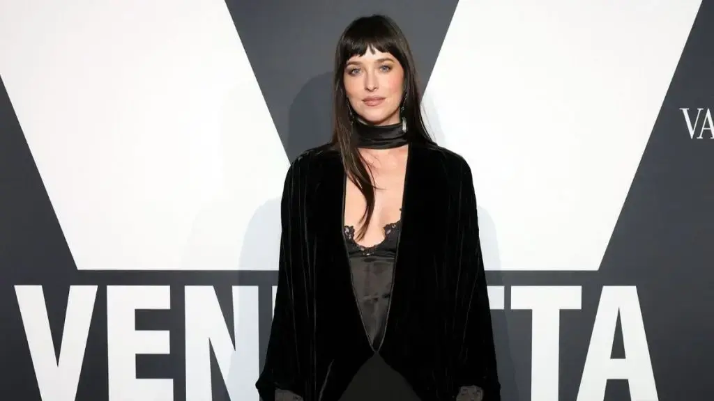 Dakota Johnson Stuns in Deep Plunge Valentino Gown