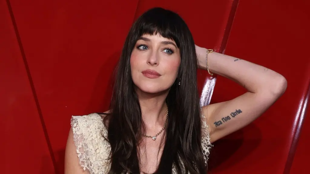 Dakota Johnson Stuns in See-Through Lace at London Screening