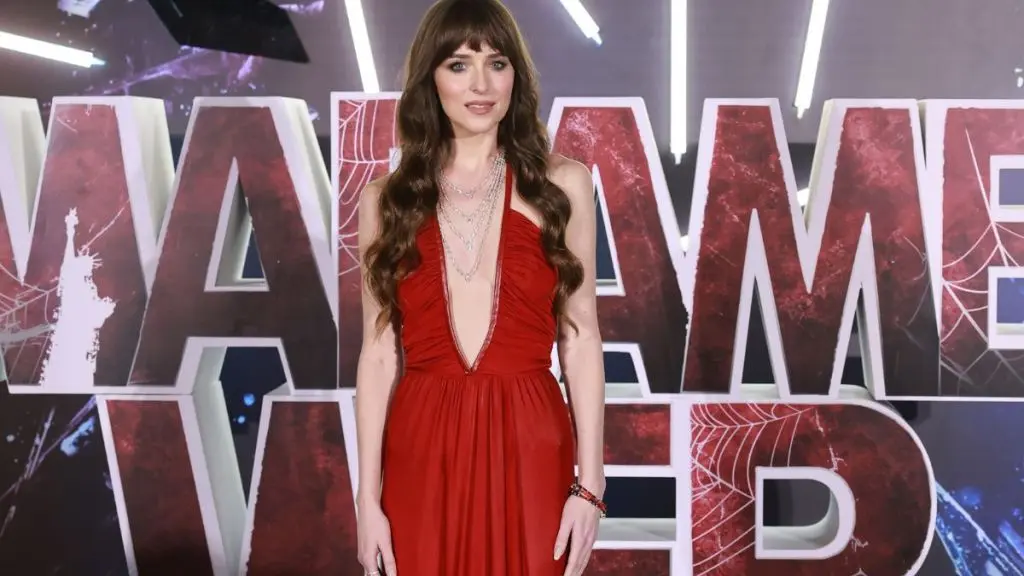 Dakota Johnson Wows in Sheer Red Tank Top for Verity Promotional Tour