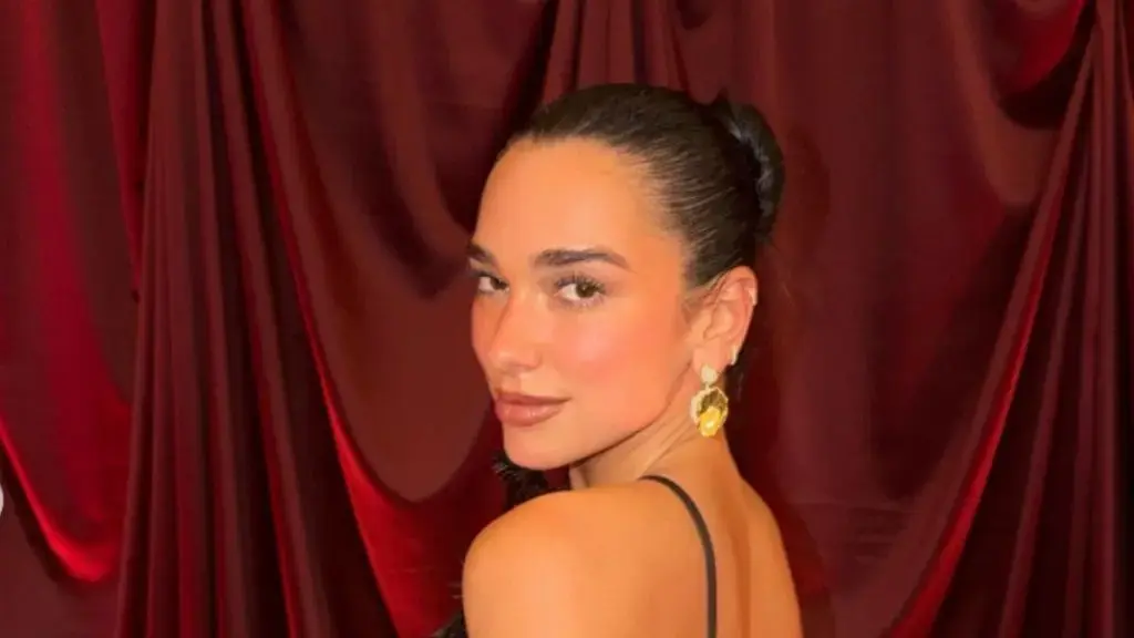 Dua Lipa Stuns in Backless The Attico Dress at Family Wedding