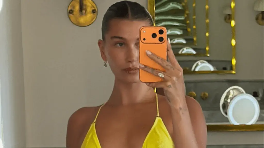 Hailey Bieber Stuns in Lacy Slip Dress for Date Night Outing