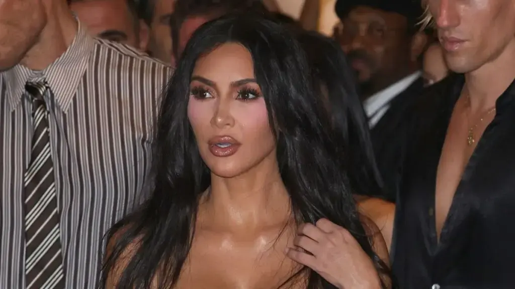 Kim Kardashian Stuns in Caramel Ensemble at London SKIMS Launch