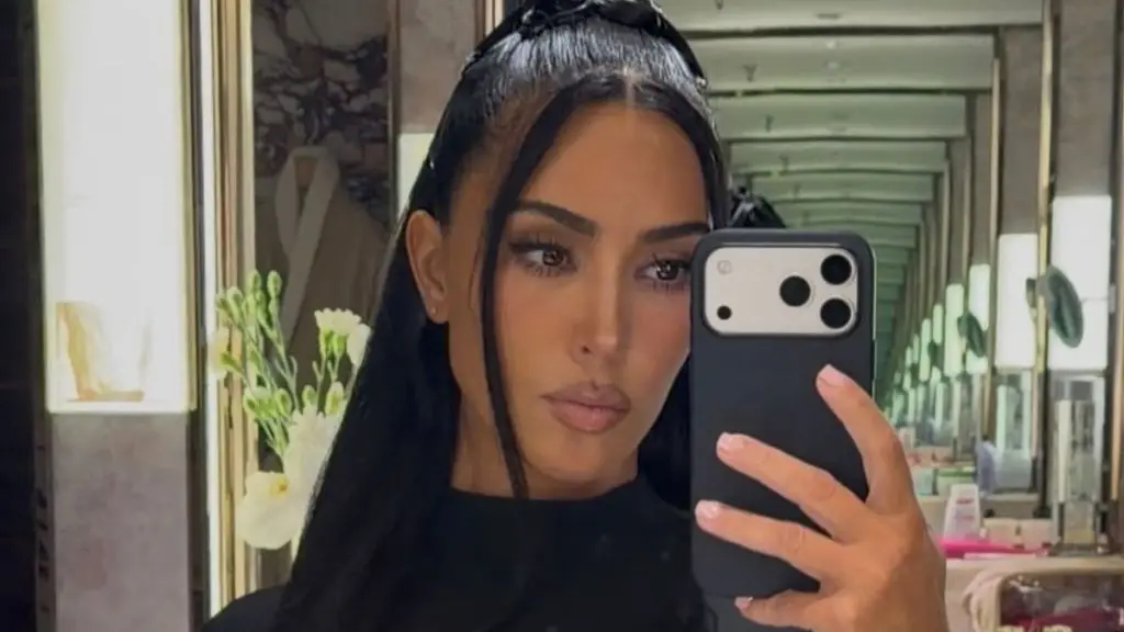 Kim Kardashian Wears Plunging Racerback Bra in New Campaign