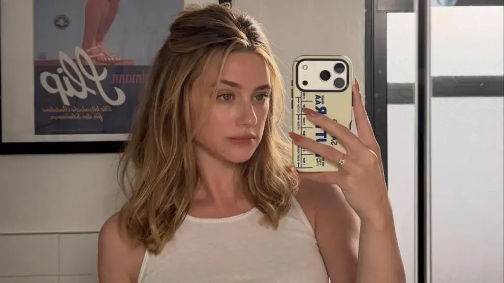 Lili Reinhart Stuns in Plunging Betsey Johnson Gown With Dramatic Slits