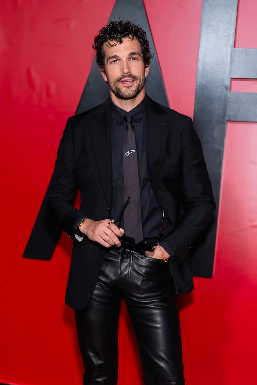 Paul Anthony Kelly trades preppy style for leather at AHS premiere