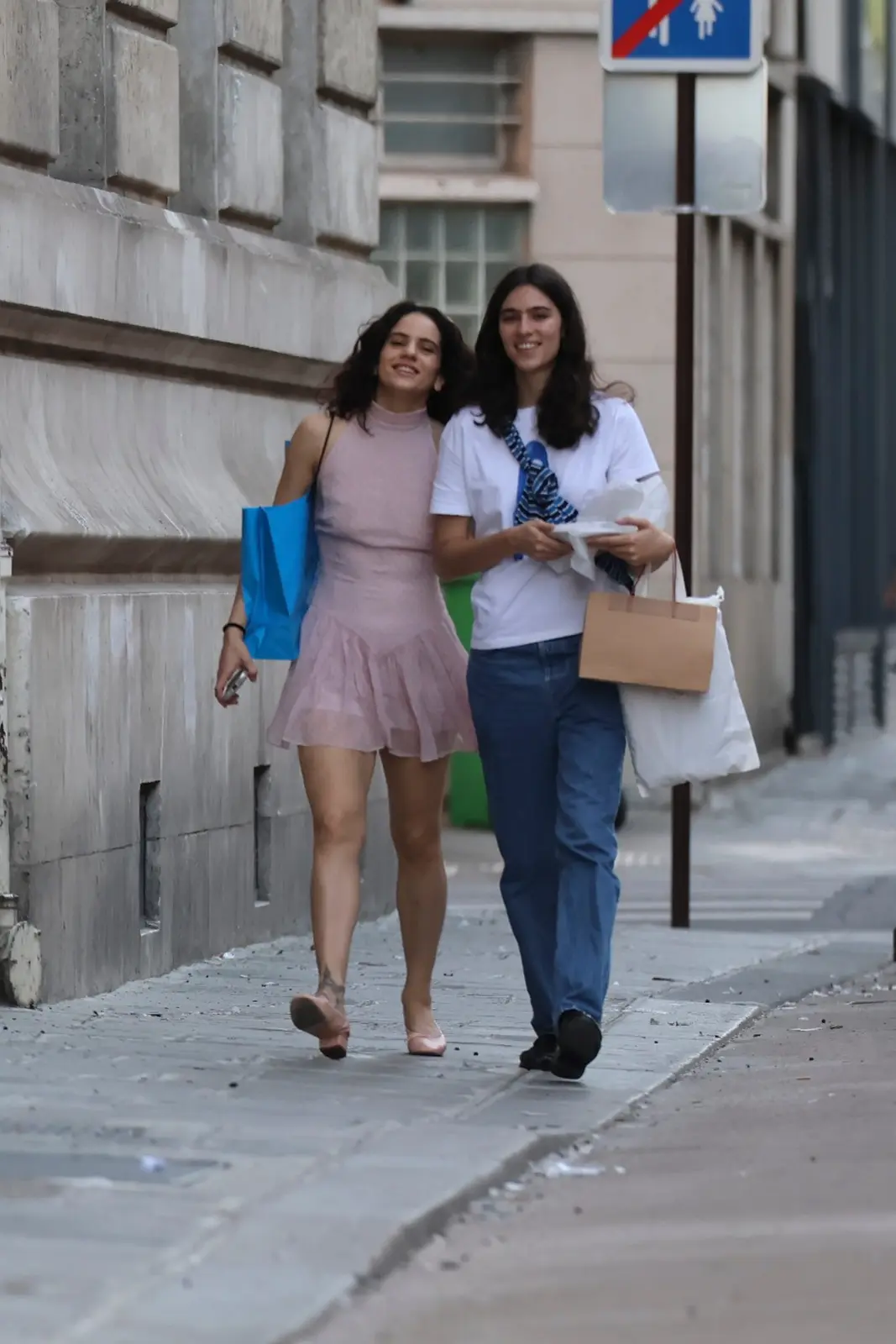 Rosalía Embraces Ballet Aesthetic in Paris with Coordinated Outfit and Girlfriend Stroll