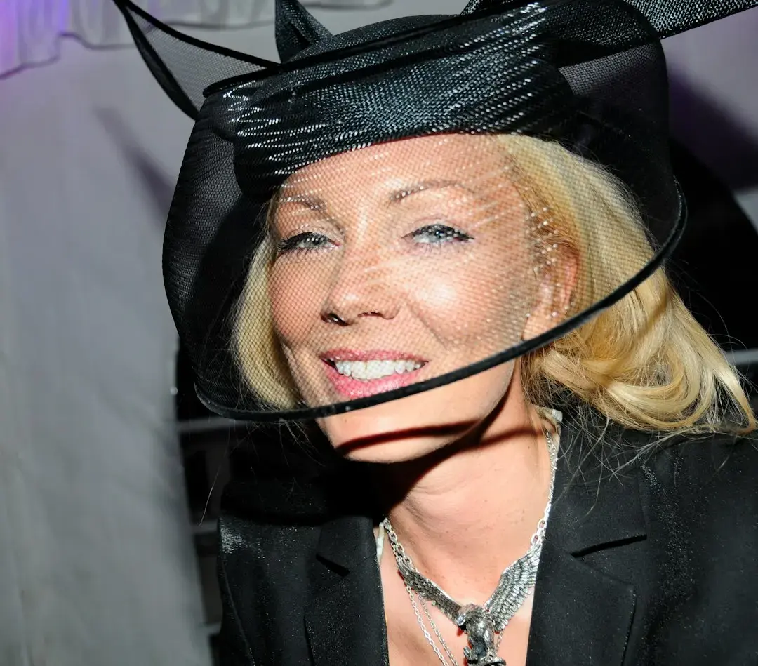 Sharon Stone Attends Cos Show in Black Boots Despite PETA Protest