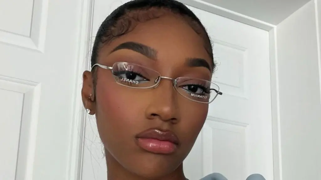 Angel Reese Turns Heads in Unzipped Balmain Dress Before WNBA Game