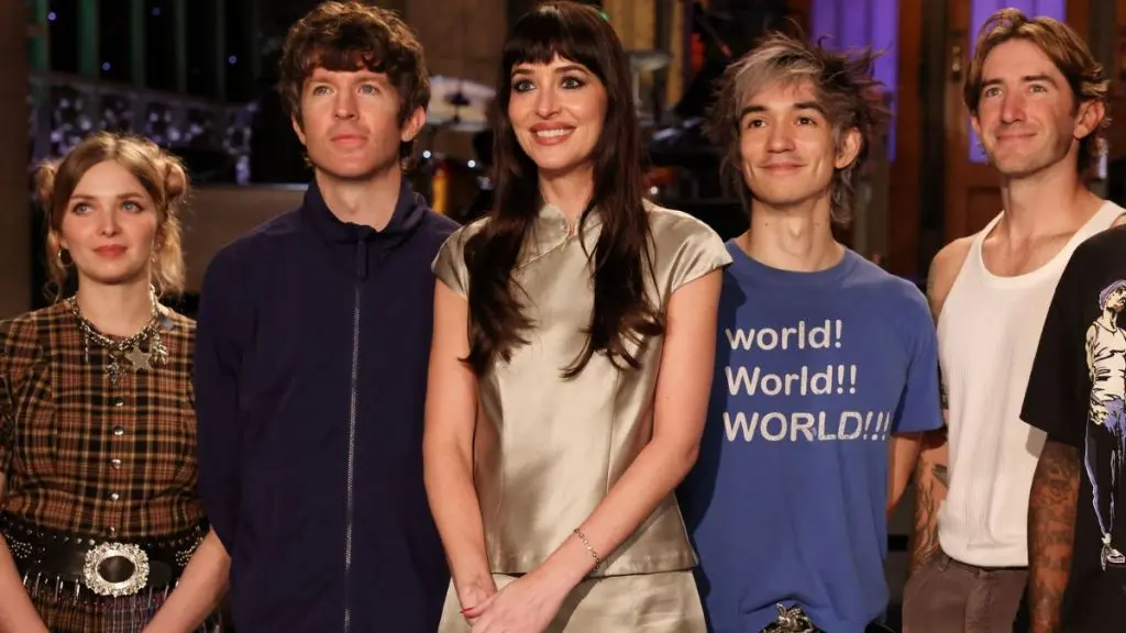 Dakota Johnson Stuns in Minimalist Ensemble Ahead of Saturday Night Live Hosting Gig