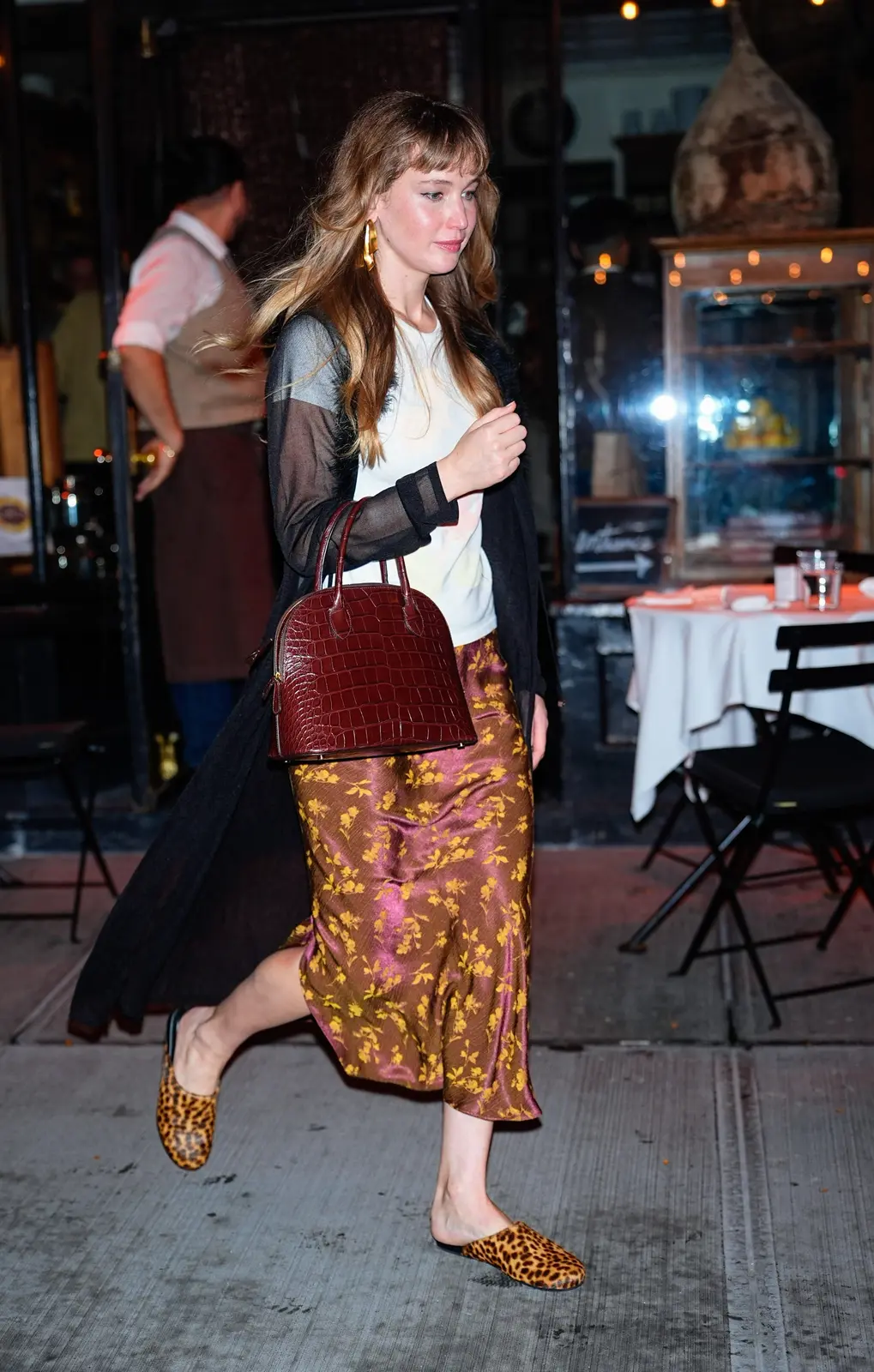 Jennifer Lawrence Mixes Fall Patterns With a Brown-and-Mustard Dries Van Noten Skirt and Leopard-Print Slides