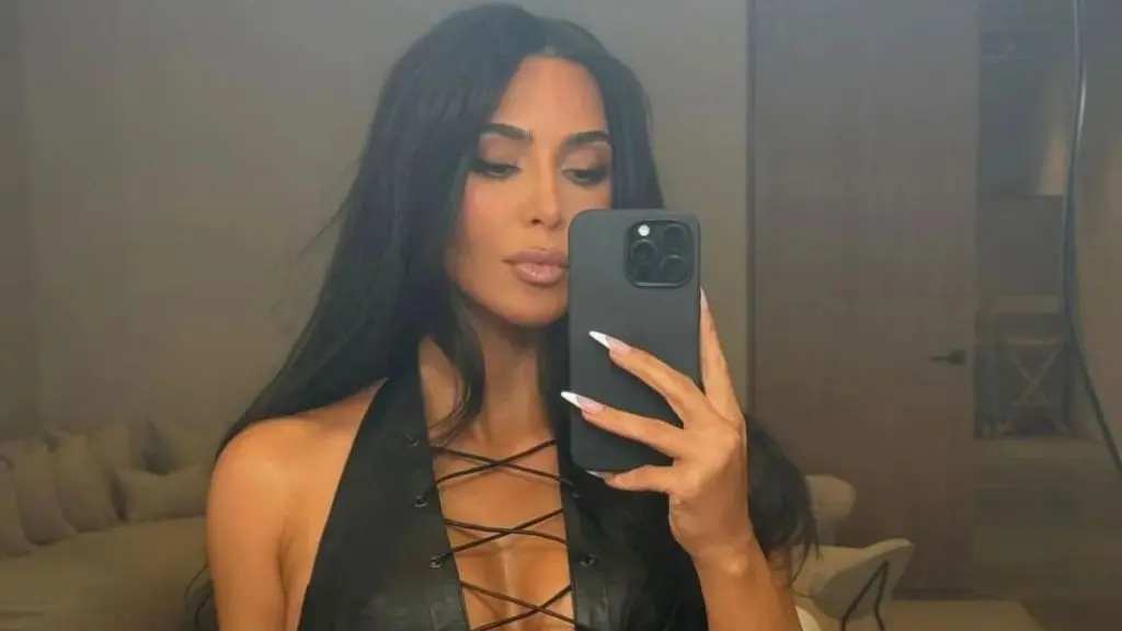 Kim Kardashian’s Voluptuous Curves Take Over in a Dress With a Wildly Low Cut