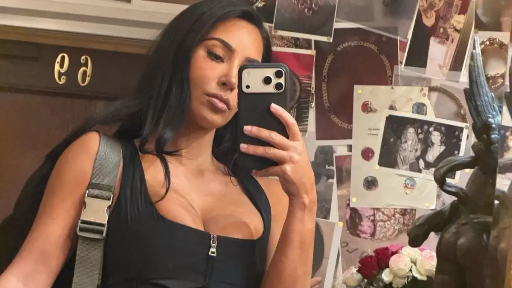 Kim Kardashian Showcases Matching Bra in Unzipped Sweater Photo