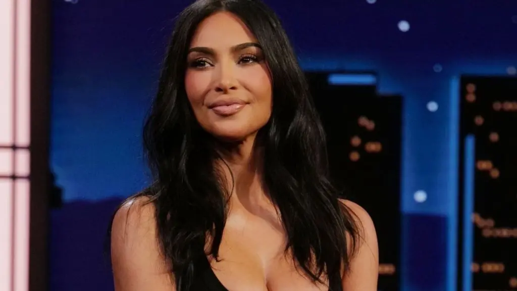 Kim Kardashian Wears Plunging Sportmax Dress on Late-Night Talk Show