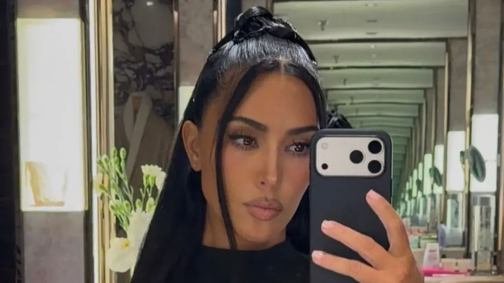 Kim Kardashian Showcases SKIMS Dress While Ordering DoorDash