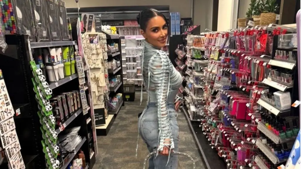 Kim Kardashian’s Plunging Dress Barely Hangs on by the Thinnest Strings