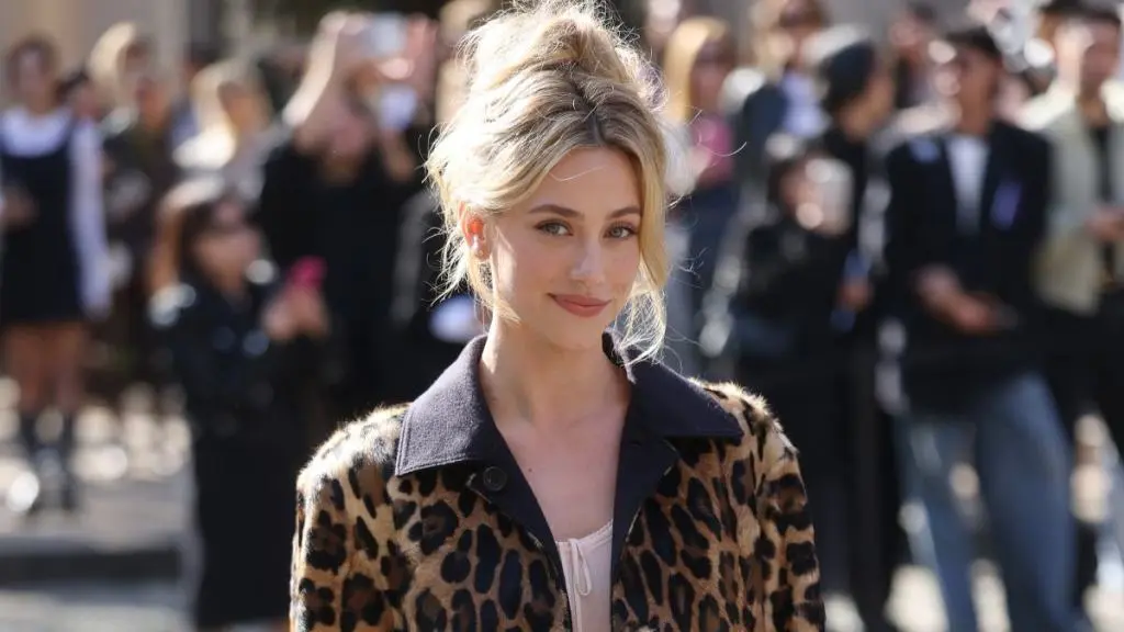 Lili Reinhart Wows in Bold Miu Miu Micro Minidress at Paris Fashion Week