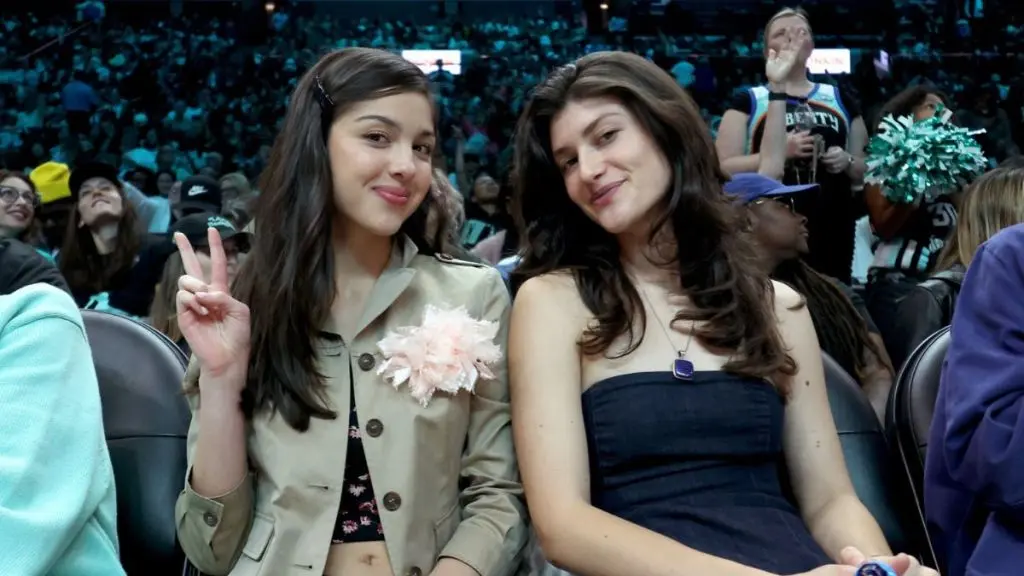 Olivia Rodrigo Debuts Court-Side Vintage Floral Fashion