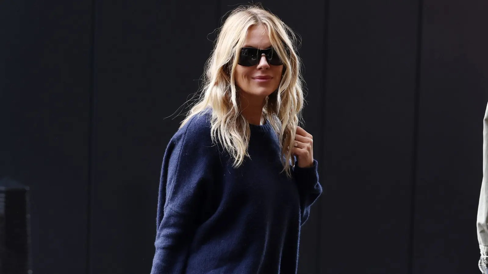 Sienna Miller Spotted in London Wearing Chic Flat Knee-High Boots